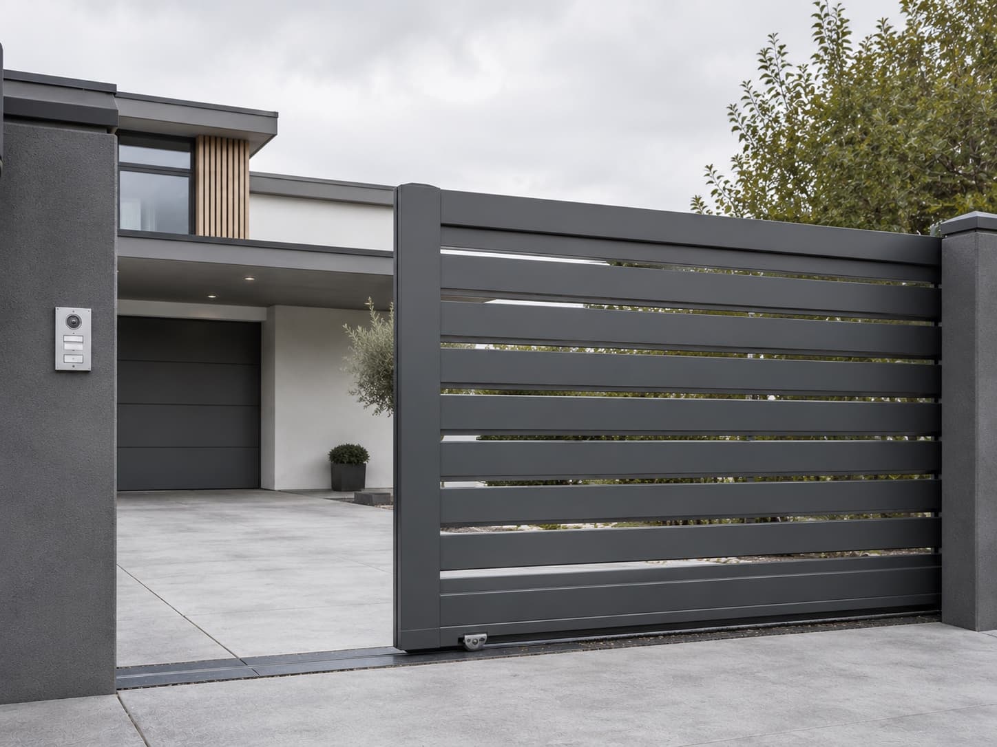 Anthracite aluminium sliding gate on a private driveway