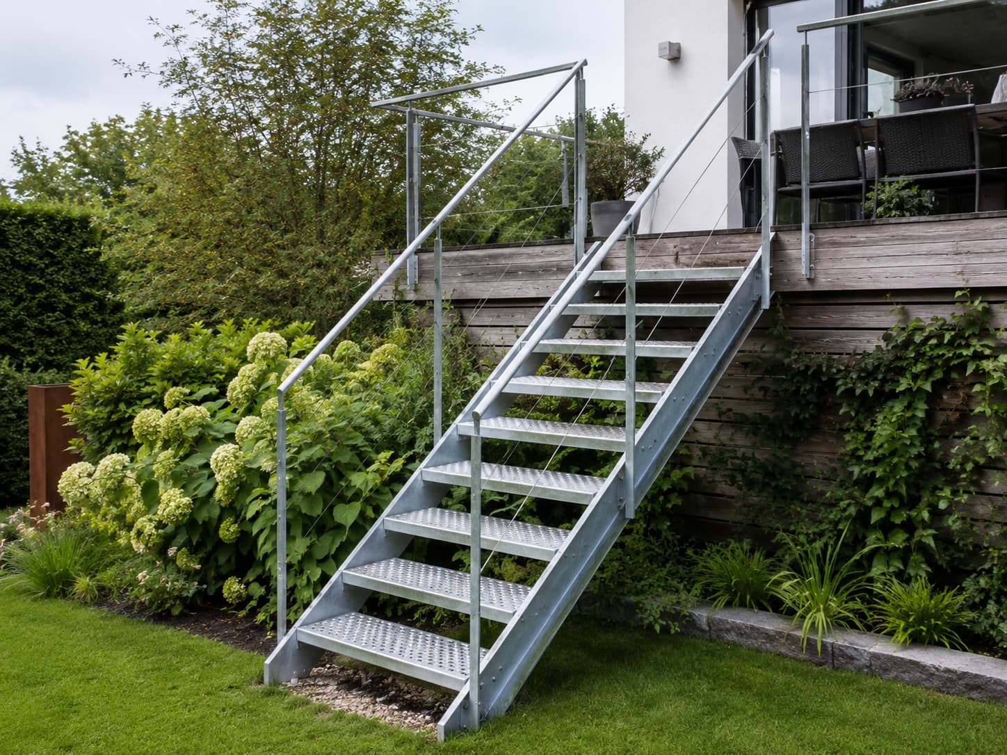 Hot-dip galvanised steel exterior staircase leading to a terrace
