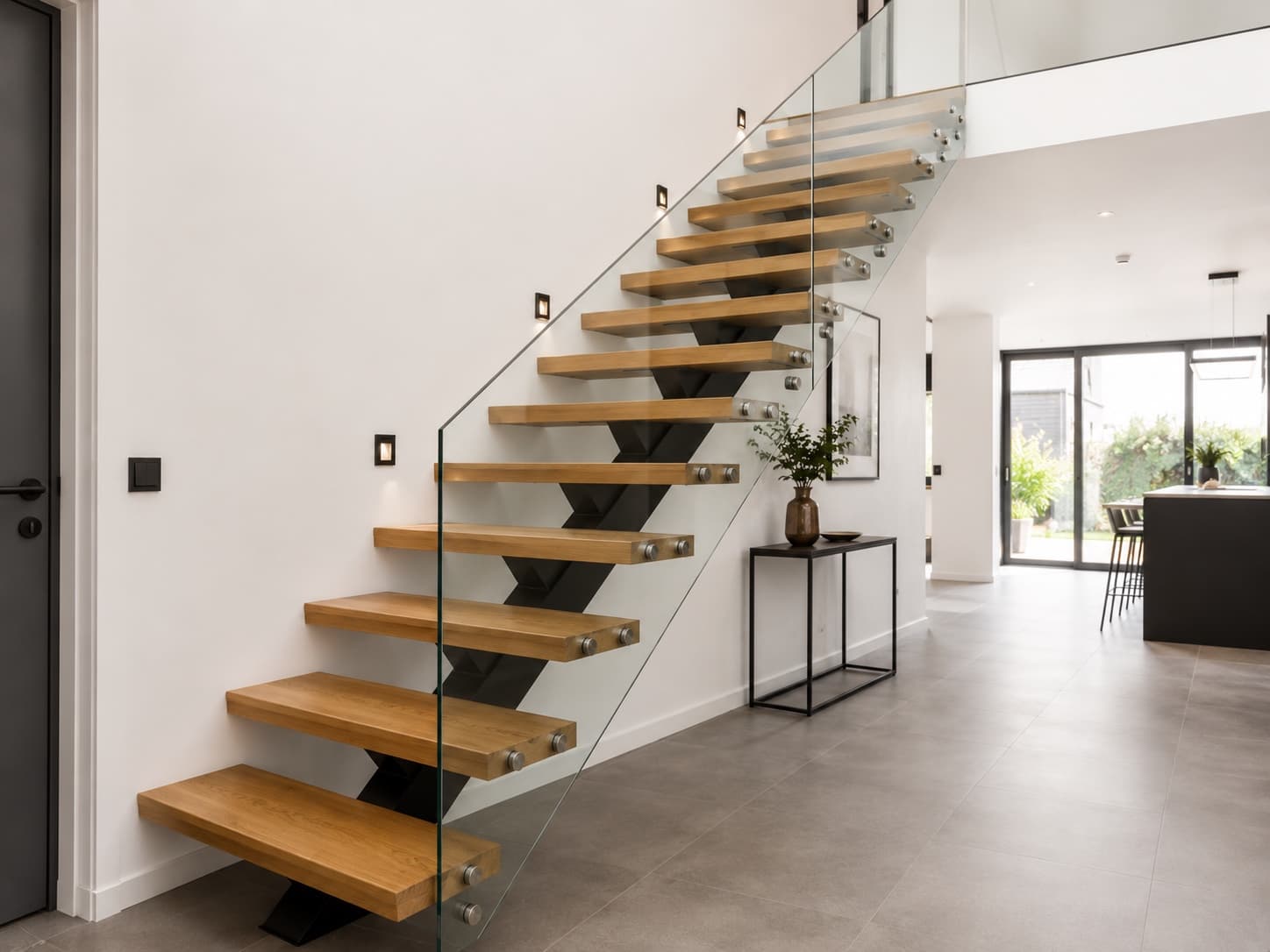 Central stringer staircase with cantilevered oak steps